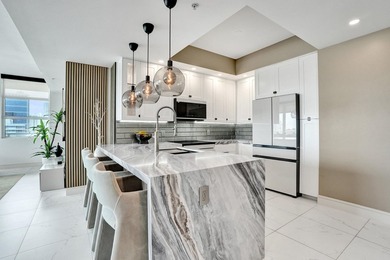 WOW!!!..Absolutely GORGEOUS with SWEEPING SKYLINE VIEWS from - photo 2