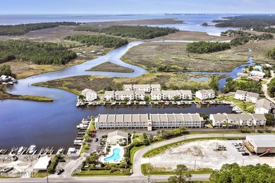 Welcome to Harbor Landing Condominiums -- where gated, coastal - photo 1
