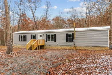 Mohawk Lake Home For Sale in Crossville Tennessee