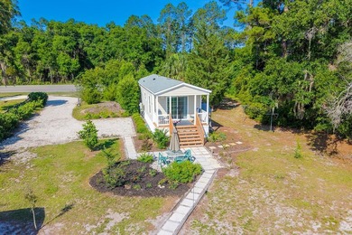 Located on the shores of beautiful Lake Higginbotham in - photo 3
