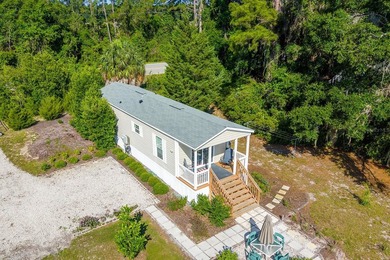 Located on the shores of beautiful Lake Higginbotham in - photo 4