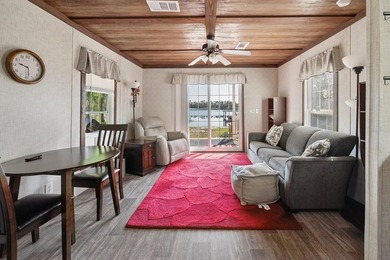 Located on the shores of beautiful Lake Higginbotham in - photo 6