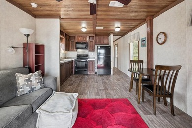Located on the shores of beautiful Lake Higginbotham in - photo 8