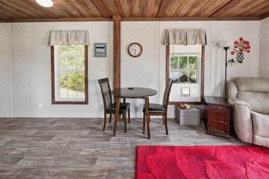 Located on the shores of beautiful Lake Higginbotham in - photo 9