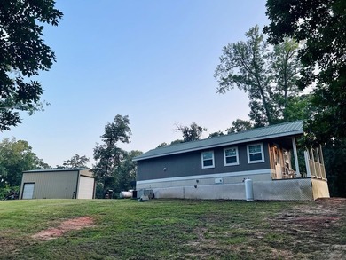 Located in the Fairmount Community, this charming tiny home - photo 14