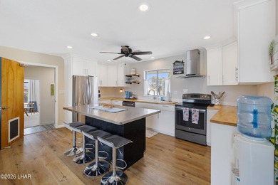 This one truly stands out on the sought-after north lakeside of - photo 9