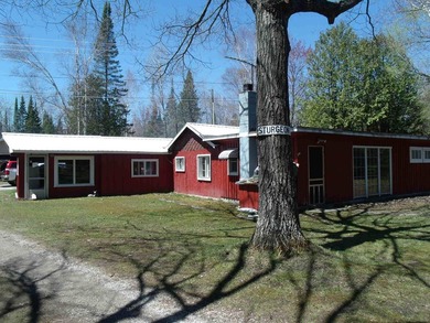 Looking for an Up North waterfront getaway with potential? This - photo 2