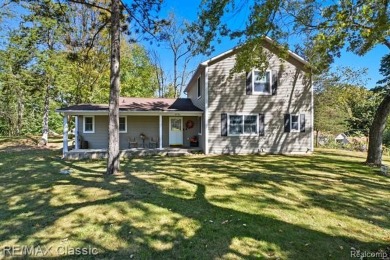 Half Moon Lake - Washtenaw County Home Active Under Contract in Gregory Michigan