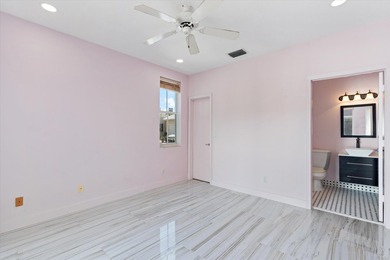 This beautifully renovated 2-bedroom, 2.5-bath townhome offers a - photo 22