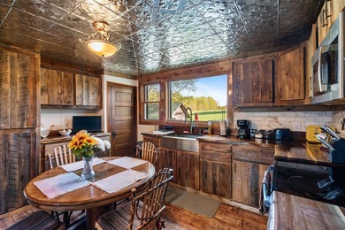 Situated on 3.37 private acres, this unique 4-bedroom, 2-bath - photo 5