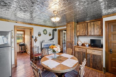 Situated on 3.37 private acres, this unique 4-bedroom, 2-bath - photo 6
