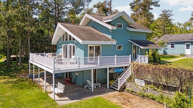 Welcome to Dixon Lake! Boasting 100 feet of frontage on this - photo 1