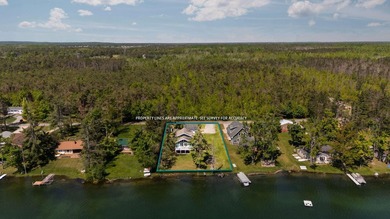 Welcome to Dixon Lake! Boasting 100 feet of frontage on this - photo 3