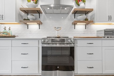 Welcome to this exceptional first tier ranch home in the - photo 22