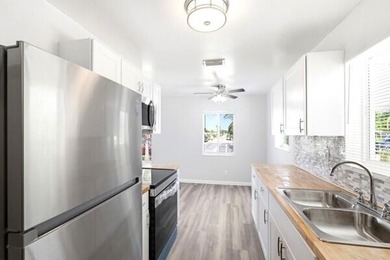 Beautifully renovated 3 Bedroom SINGLE FAMILY HOME in the - photo 6