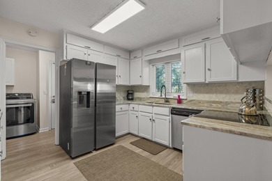 Southern charm by the coast! Welcome to Arcadian Shores, a - photo 12