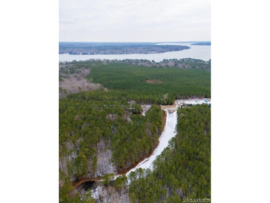 Tucked within the gates of Harbor Landing, Lot 67 offers just - photo 5