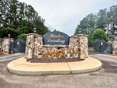 Tucked within the gates of Harbor Landing, Lot 67 offers just - photo 7