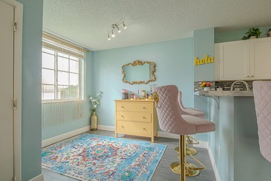 Step into this updated first-floor condo perfectly situated in - photo 5