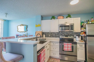 Step into this updated first-floor condo perfectly situated in - photo 7