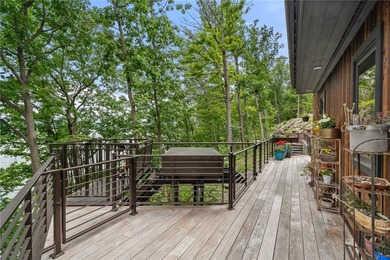 This exceptional lakeside estate offers 13.69 acres of wooded - photo 37