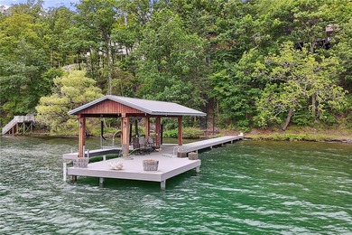 This exceptional lakeside estate offers 13.69 acres of wooded - photo 40
