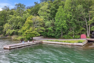 This exceptional lakeside estate offers 13.69 acres of wooded - photo 41