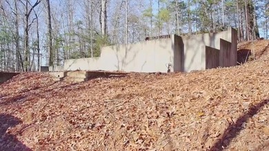 This 1.26 acre lot has foundation, septic, water, and power!!! - photo 1