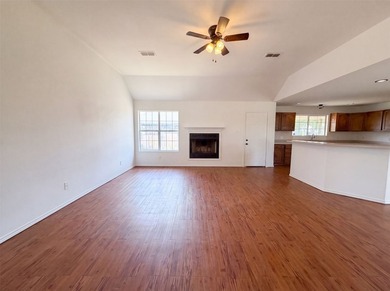 201 Driftwood Ct is a one-story Runaway Bay brick home. The - photo 3