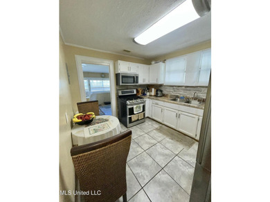 This charming home is a spacious five-bedroom, two full bath - photo 7
