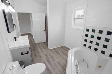 Affordable LAKE living with room to grow! This fantastic - photo 32