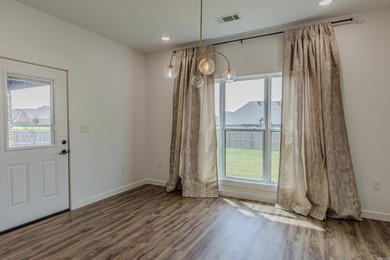 Beautiful approx. 2130 sq ft brick home featuring an open floor - photo 19