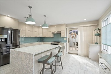 Welcome home to 939 Manor Lane in Bay Shore. This meticulously - photo 11