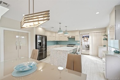 Welcome home to 939 Manor Lane in Bay Shore. This meticulously - photo 12