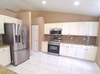 Step into this beautifully maintained home packed with valuable - photo 6