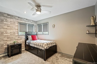 Welcome home to 939 Manor Lane in Bay Shore. This meticulously - photo 26