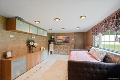 Welcome home to 939 Manor Lane in Bay Shore. This meticulously - photo 30