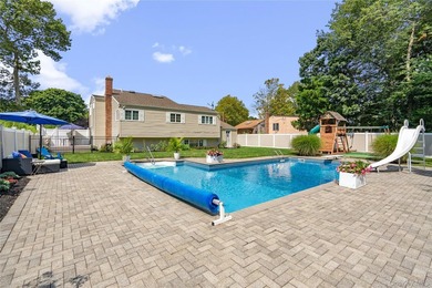 Welcome home to 939 Manor Lane in Bay Shore. This meticulously - photo 38