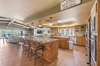 Riverfront Pool Home! Custom Riverfront Home located on the - photo 9