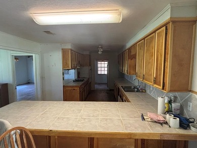 This 5 bedroom, 2 1/2 bath home on 1 acre of land with an - photo 13