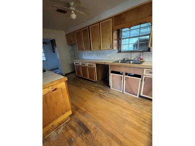 This 5 bedroom, 2 1/2 bath home on 1 acre of land with an - photo 14