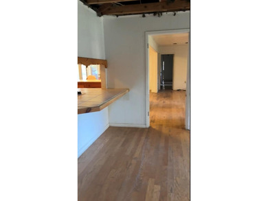 This 5 bedroom, 2 1/2 bath home on 1 acre of land with an - photo 24