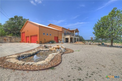 Set on more than six private acres overlooking Canyon Lake, this - photo 29