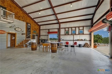 Set on more than six private acres overlooking Canyon Lake, this - photo 32
