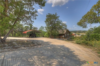 Set on more than six private acres overlooking Canyon Lake, this - photo 34
