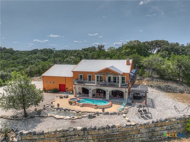 Set on more than six private acres overlooking Canyon Lake, this - photo 48