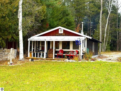 Lake Home For Sale in Grawn, Michigan