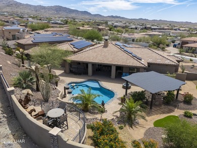 Nestled on over 0.66 acres on a prime corner lot in the - photo 1