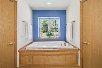 Set gracefully beyond a long, tree-lined drive, this - photo 31