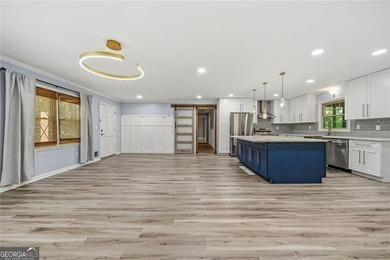A beautifully maintained home with serene views of Canary Lake - photo 8